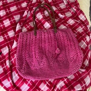 Pink Cappelli straw beach bag with small rip